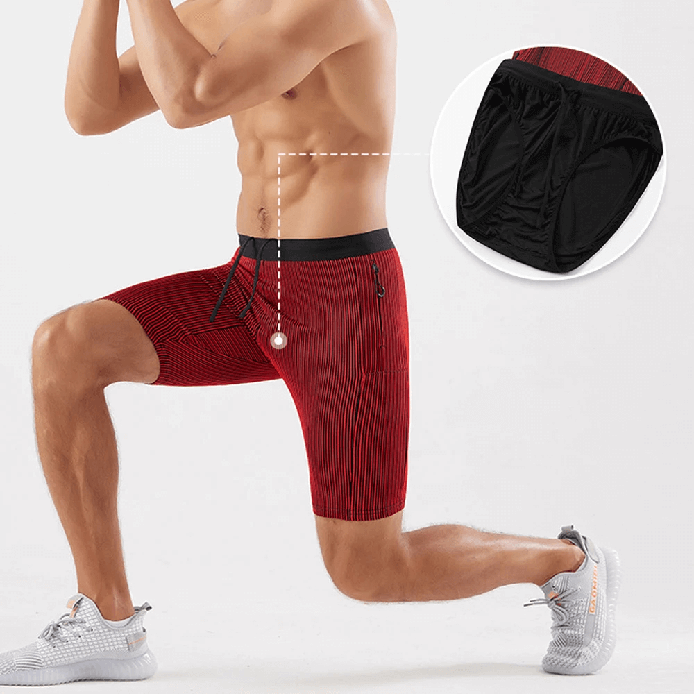 Man wearing red striped quick-dry swim trunks with pocket, showcasing breathable inner lining, perfect for modern active lifestyles.